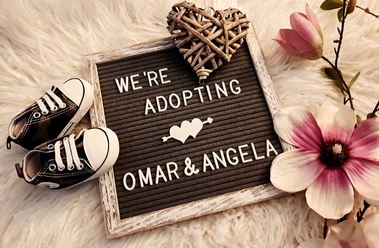 Omar & Angela Kinder adoption photo 1