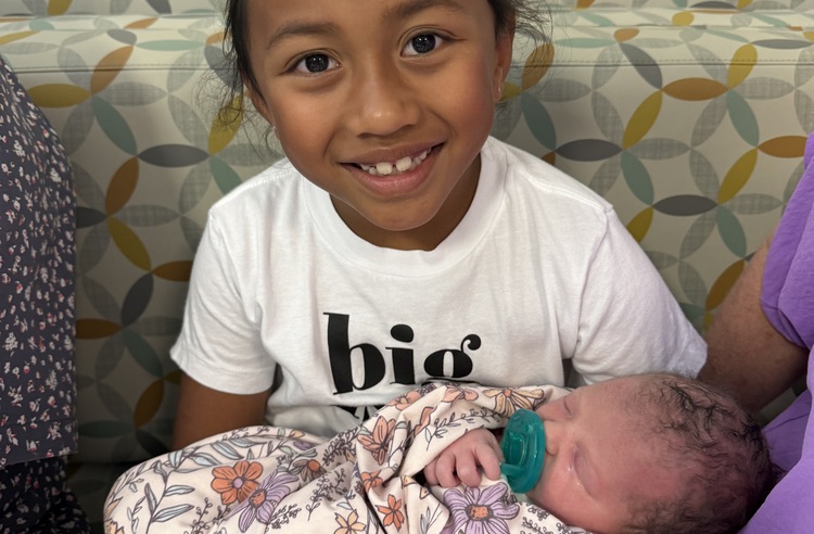 Taylor and Amber Tinsley adoption photo 3